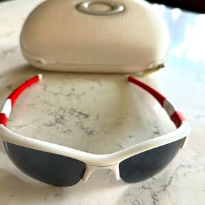 Red and White Oakley Sunglasses with Accessories (hard case included)